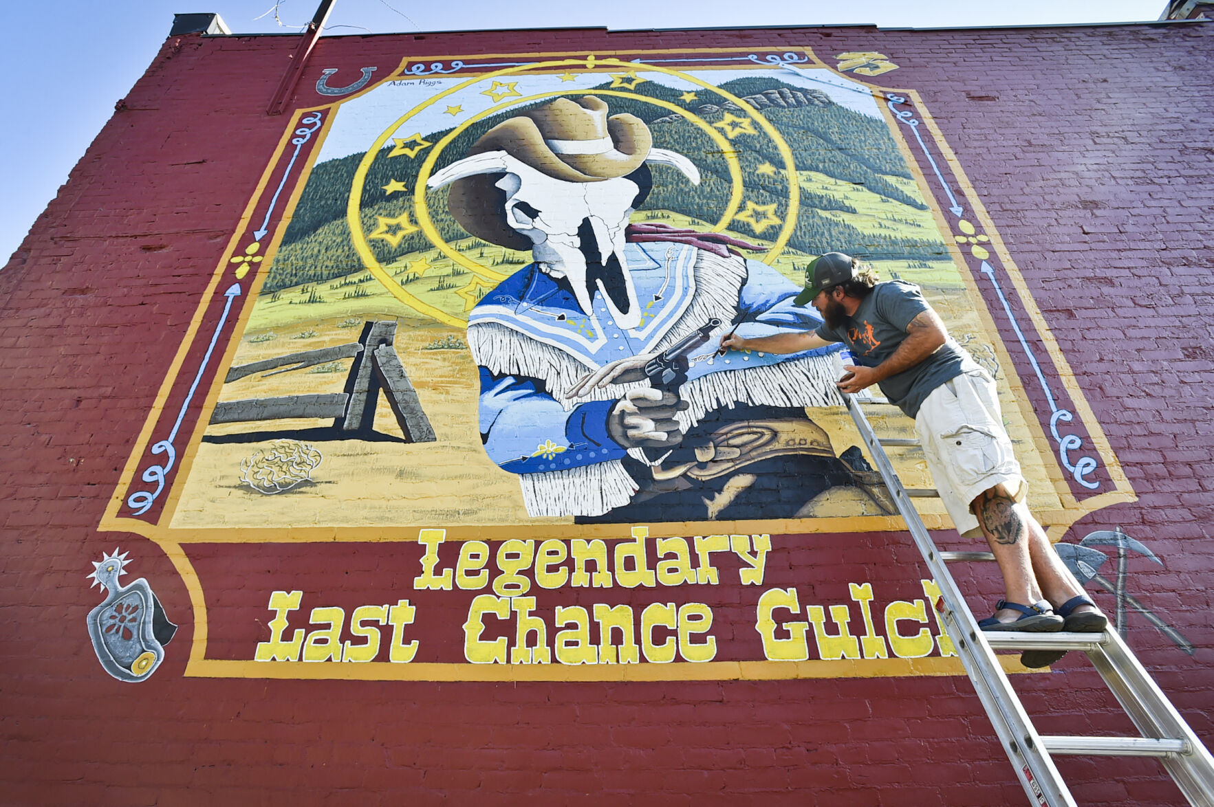 Helena artist Adam Riggs put the finishing touches